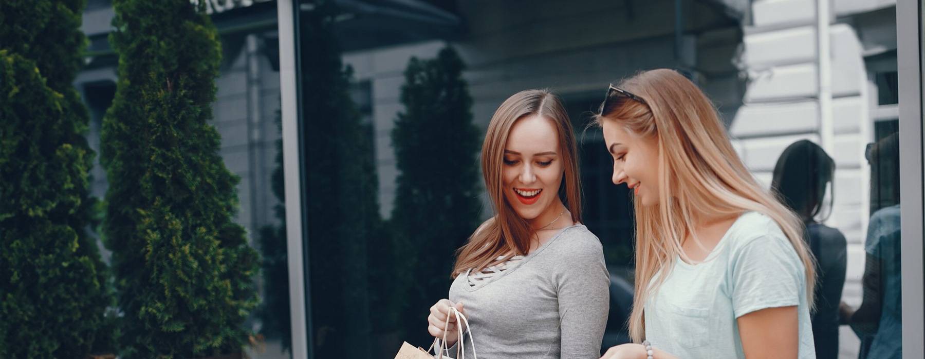 two women shopping outdoors